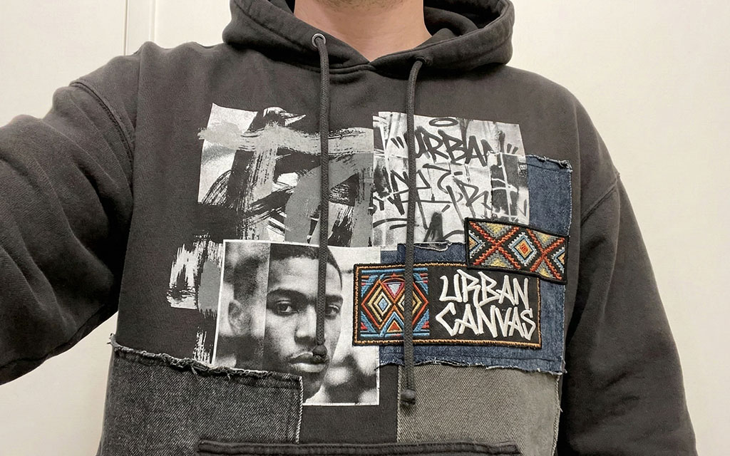 Creative hoodie design with art-inspired urban collage elements and graffiti-style graphics for unique statement pieces